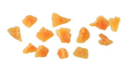 Candied melon pieces with sugar flying isolated on white background. Healthy dessert with fiber and vitamin.