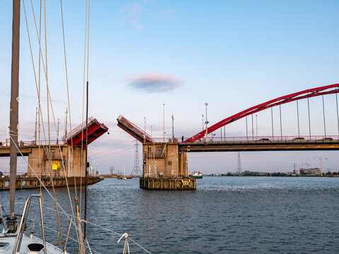Drawbridge Schellingwouderbrug opening for boats on Buiten IJ, Amsterdam