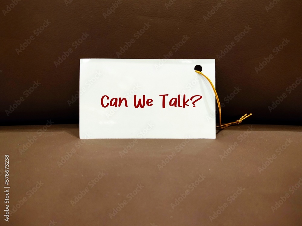 Poster card on sofa with handwritten text can we talk?, concept of to approach for having serious talk or d
