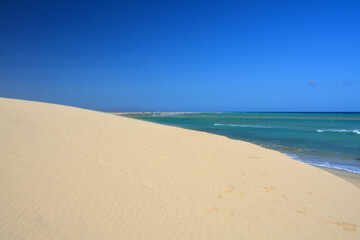 Dune at Sotavento beach and lagoon at Fuerteventura island in Canary Islands, Spain.