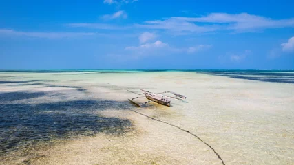 Papier Peint photo Plage de Nungwi, Tanzanie The picturesque Nungwi beach in Zanzibar, Tanzania is showcased in a toned aerial view image, highlighting the luxury resort and turquoise ocean waters.