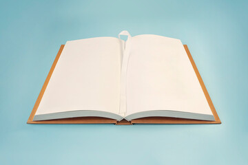 Open book of blank pages on blue background. top view. copy space