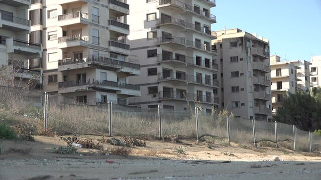 Broken and abandoned apartment towers at the beach of Varosha, a once thriving holiday and resort destination in Famagusta, Cyprus
