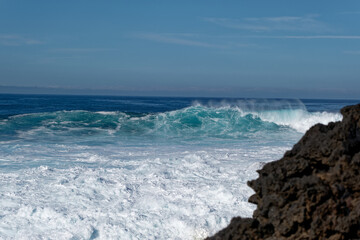 waves crashing on the rocks