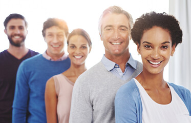 Everyone has a vital role to play in this team. Cropped portrait of a diverse business team.
