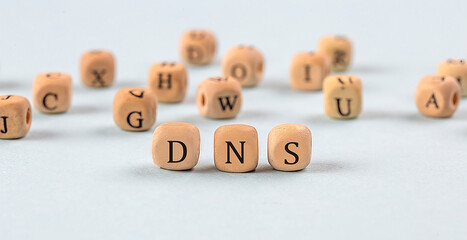 DNS written on a wooden cube , business concept