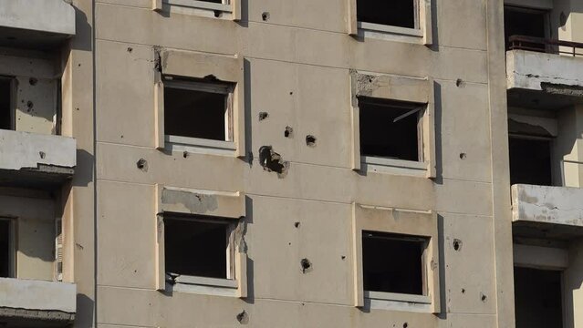 Bullet holes on a building in 'ghost town' Varosha in Famagusta remind of the Turkish invasion of Northern Cyprus in 1974
