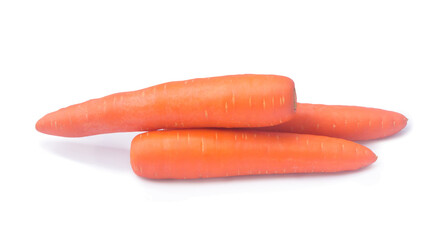 Three orange carrots vegetable in stack isolated on white background with clipping path and shadow in png file format