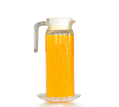 Fresh orange juice in tall jug isolated on white background with clipping path and shadow in png file format
