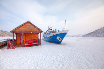 The Blue ship is surrounded by ice on Lake Baikal