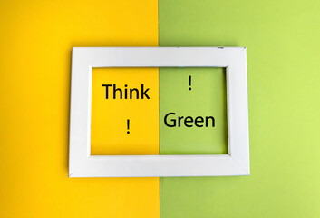 Think green text in a frame on yellow and green background