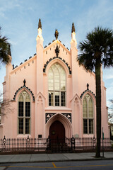 
Vertical view of the pretty pink 1844 French Huguenot Church, a Gothic Revival church located at 136 Church Street, Charleston, SC, USA - obrazy, fototapety, plakaty