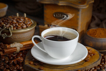 Obraz na płótnie Canvas Espresso coffee with coffee beans on old background.