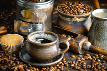 Espresso coffee with coffee beans on old background.