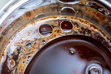 Drops of oil in liquid. Beautiful drawing in the culinary arts.