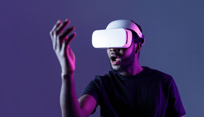 African American guy in Smart glasses of virtual reality. Augmented reality game, future...