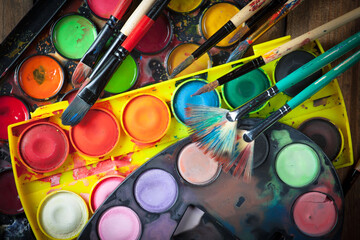 Paints and brushes for drawing. Artistic creativity.