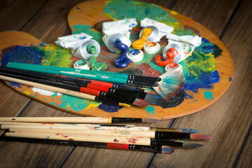 Paints and brushes for drawing. Artistic creativity.