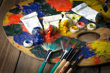Paints and brushes for drawing. Artistic creativity.