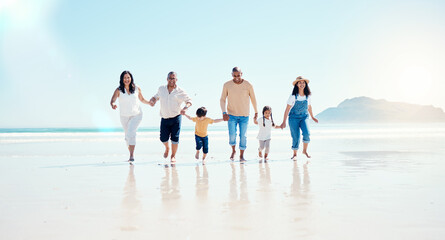 Beach, walking and mockup with a black family holding hands outdoor in nature by the ocean at sunset together. Nature, love or kids with grandparents, parents and children taking a walk on the coast