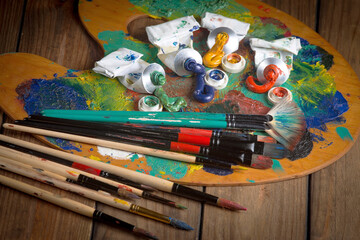 Paints and brushes for drawing. Artistic creativity.
