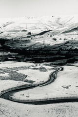 Black and White Road through a snowy landscape