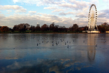 Ferris wheel and frozen lake at Hyde Park, London