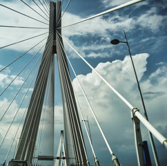 Driving across Rio-Antirio bridge in Greece on a cloudy day looking up