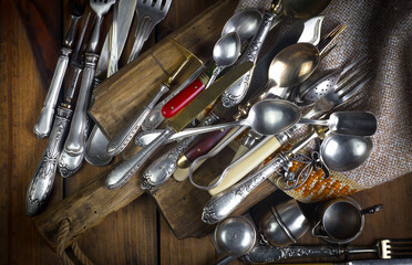 Silverware on an old background.