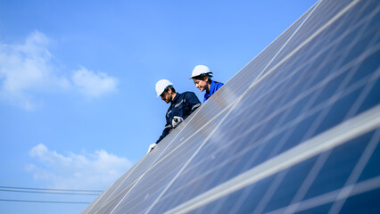Solar panel station, Engineer installing solar panel at solar energy farm field