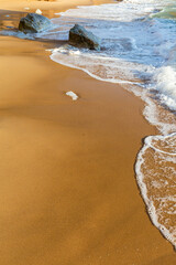 Sand and waves of Ursa beach, Portugal