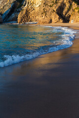 Sand and waves of Ursa beach, Portugal