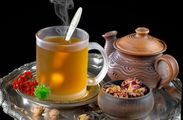 Sweet, hot tea with dessert, on an old background.