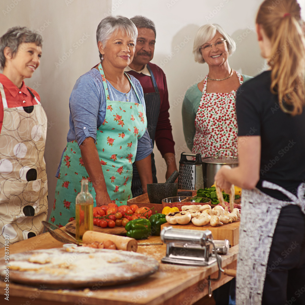 Canvas Prints Youre never too old to learn. a group of seniors attending a cooking class.