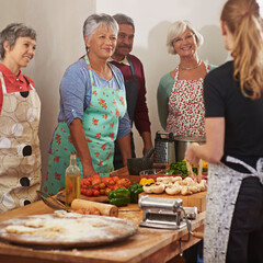 Youre never too old to learn. a group of seniors attending a cooking class.