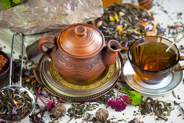 Sweet, hot tea with dessert, on an old background.