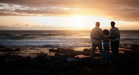 Family, sunset and mockup with people on the beach looking at the view while bonding in nature....