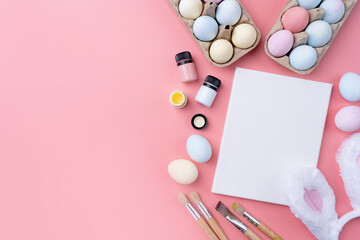 Pastel colored Easter eggs with blank white frame for mockup design