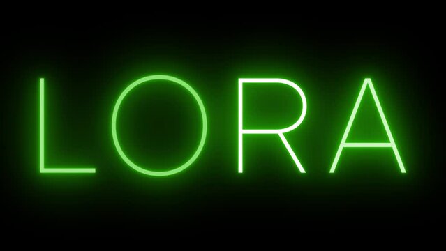 Flickering green retro style neon sign glowing against a black background