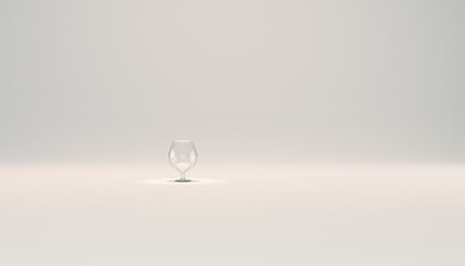 Empty Brandy or Cognac glass. White studio backdrop.