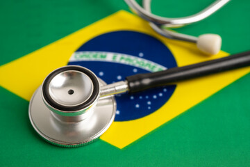 Black stethoscope on Brazil flag background, Business and finance concept. - obrazy, fototapety, plakaty