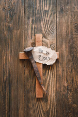 He is Risen. Jesus Crown Thorns and nails and cross on a wood background. Crucifixion Of Jesus...