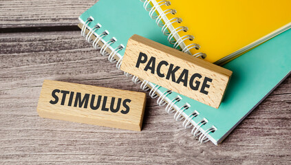 stimulus package symbol. Concept words stimulus package on wooden blocks.