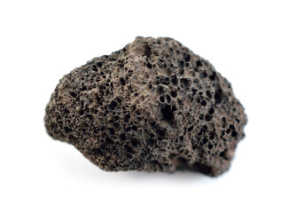 Porous black volcanic rock. Lava stone, pumice stone, or volcanic pumice with distinctive pores