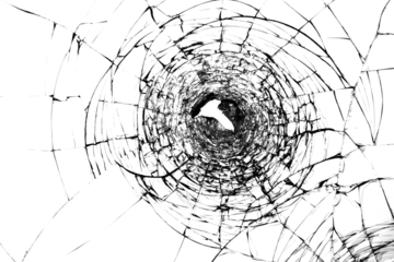 Cracks on broken glass after gun shots. Punched hole in windshield