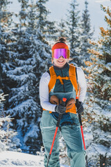 Mountaineer backcountry ski walking ski alpinist in the mountains. Ski touring in alpine landscape with snowy trees. Adventure winter sport. Kralova hola, Slovakia © Zedspider