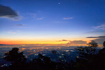 Chiangmai city at twilight, Thailand. View from Khao Kho mountain.