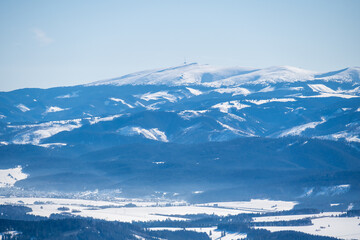 Alpine mountains landscape with white snow and blue sky. Sunset winter in nature. Frosty trees under warm sunlight. Wonderful wintry landscape. Kralova hola, Low Tatras, slovakia © Zedspider