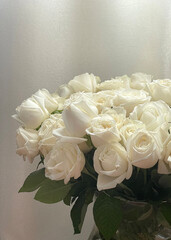 White roses bouquet. White roses in a vase.