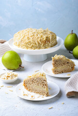 Almond Pear Cake, Delicious Dessert with Almond Flakes and Cream Filling